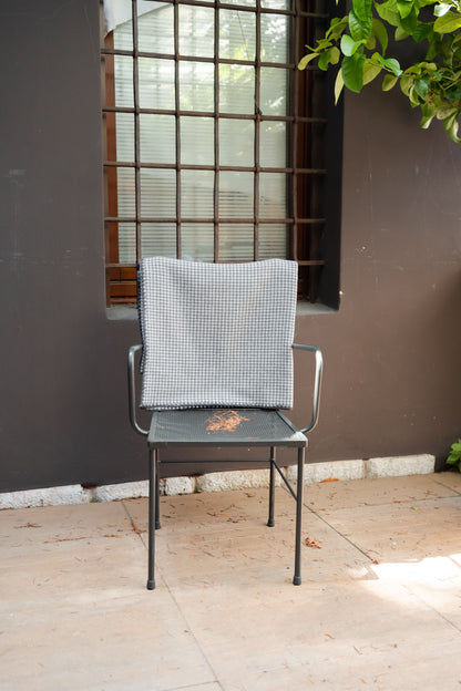 Coperta in fantasia pied de poule con bordatura