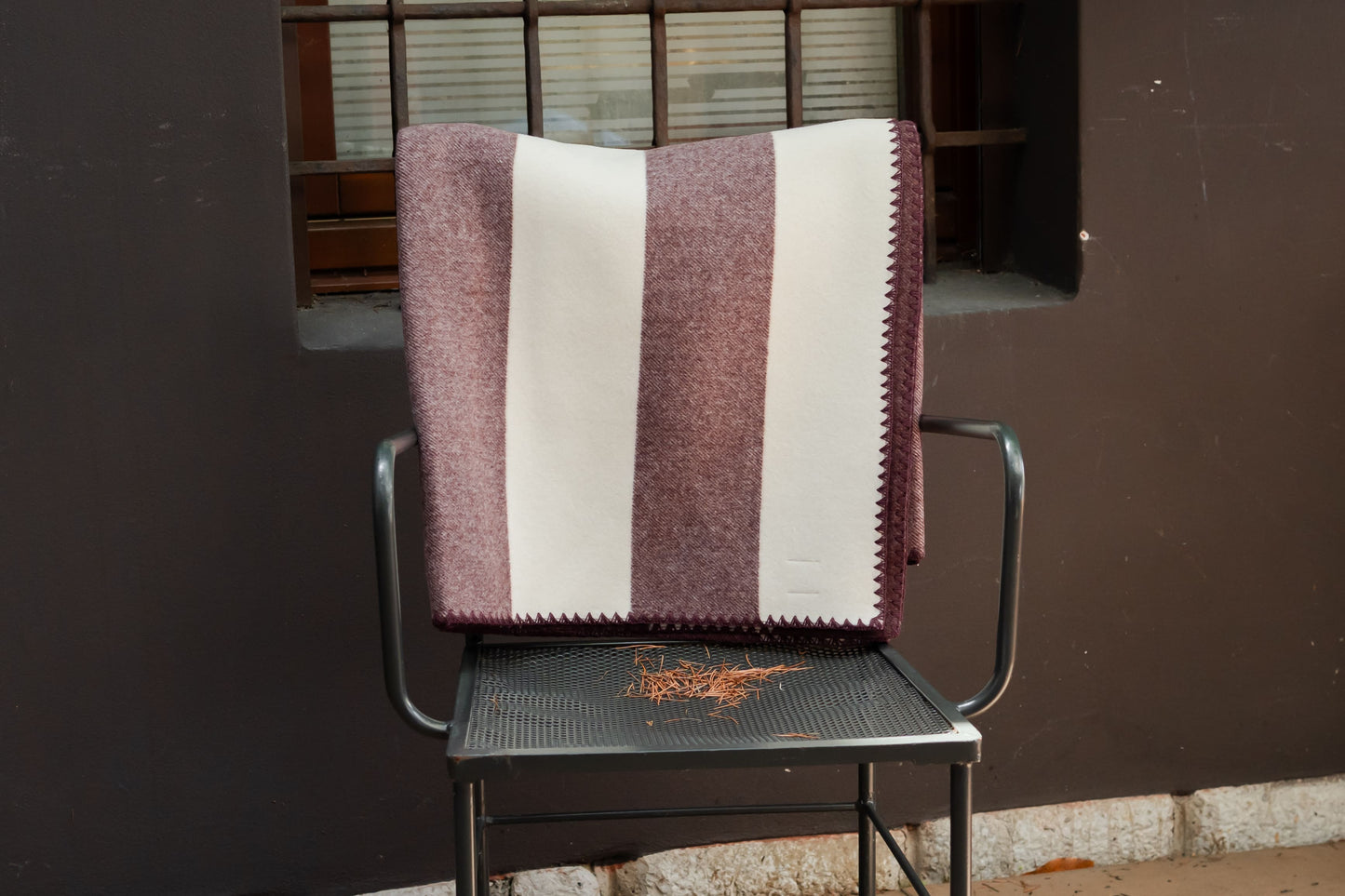 Coperta a rigoni con bordatura