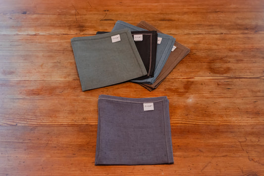 Tovagliolo unito grigio in puro lino con cucitura