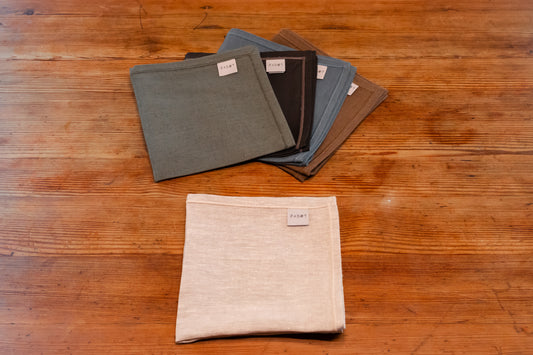 Tovagliolo unito ecrù in puro lino con cucitura